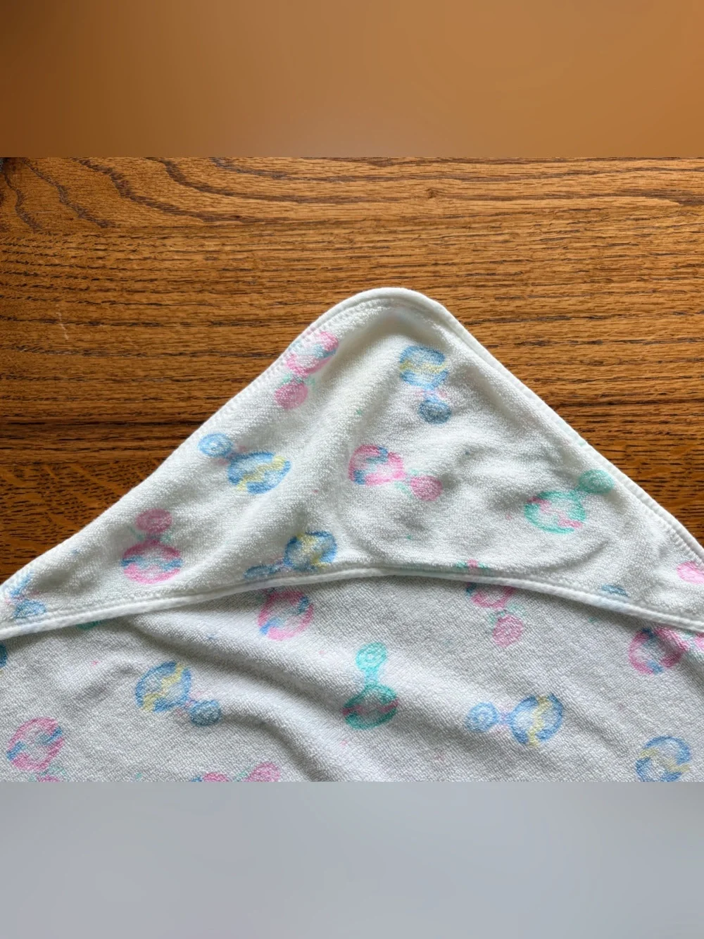 Vintage Carters-style Baby Hooded towel with Pastel Rattle Print